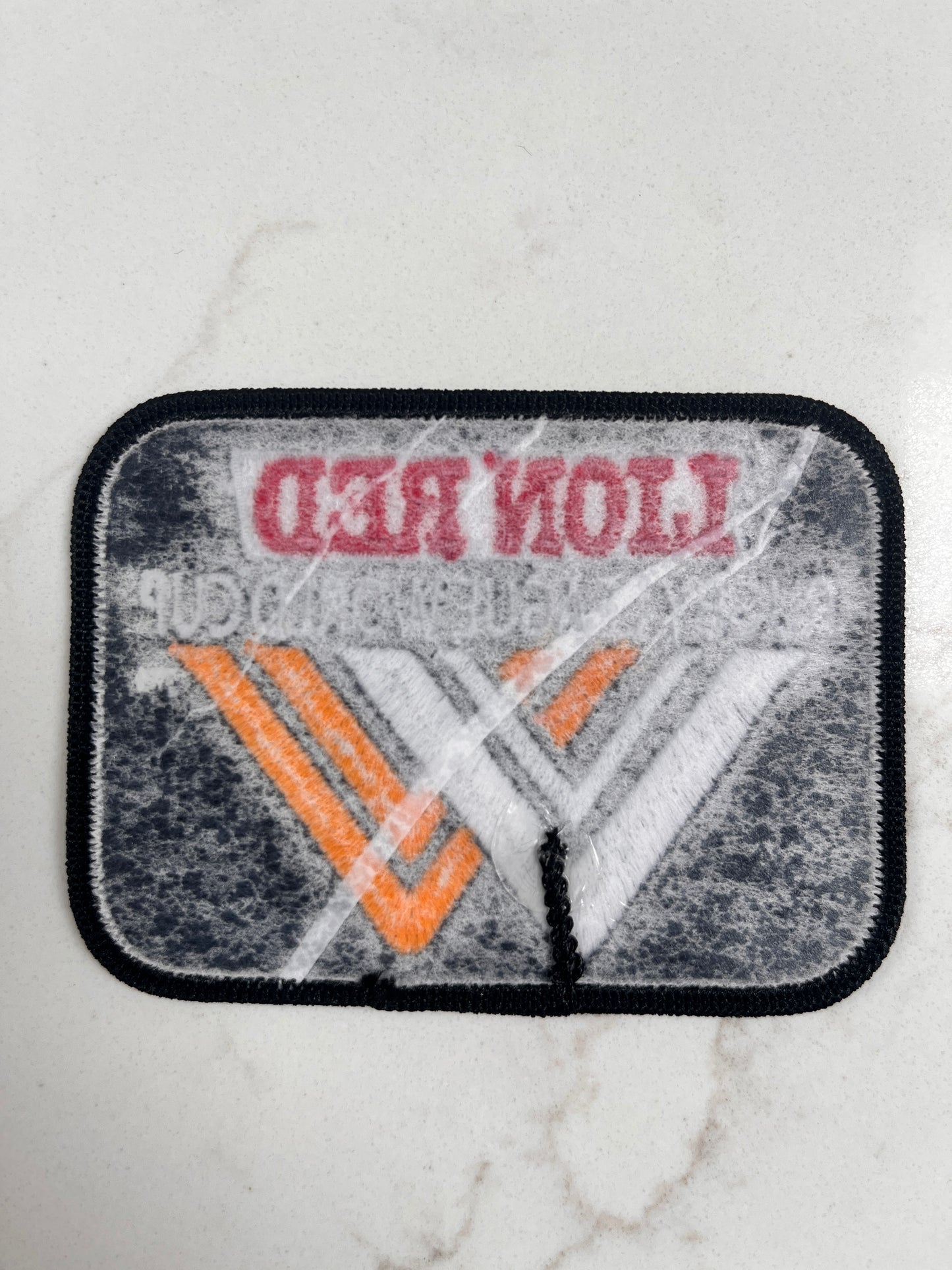 Lion Red World Cup jersey patch