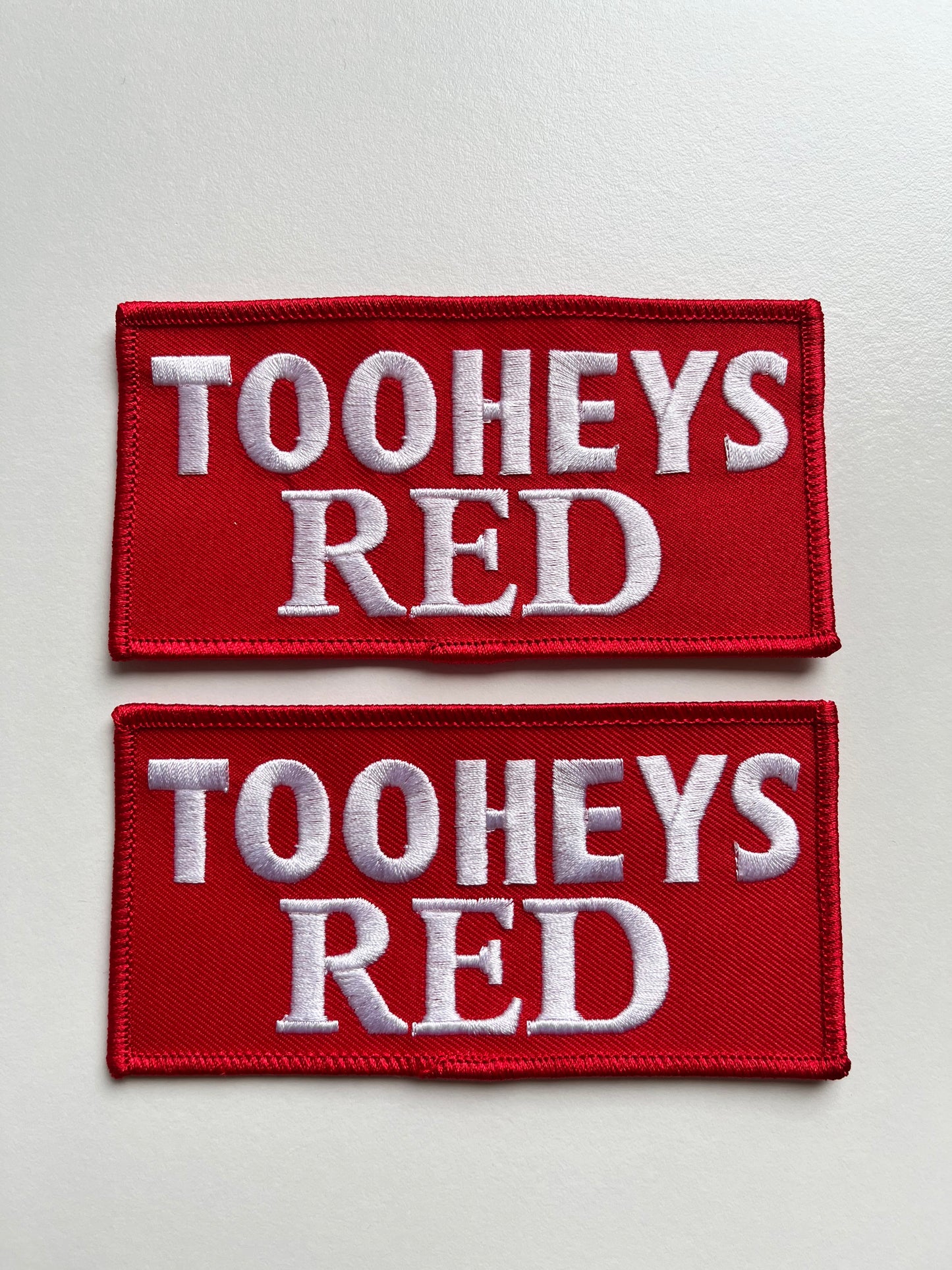 x2 Tooheys Red sleeve badges